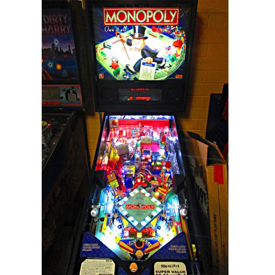 which pinball machine is better monopoly or world poker