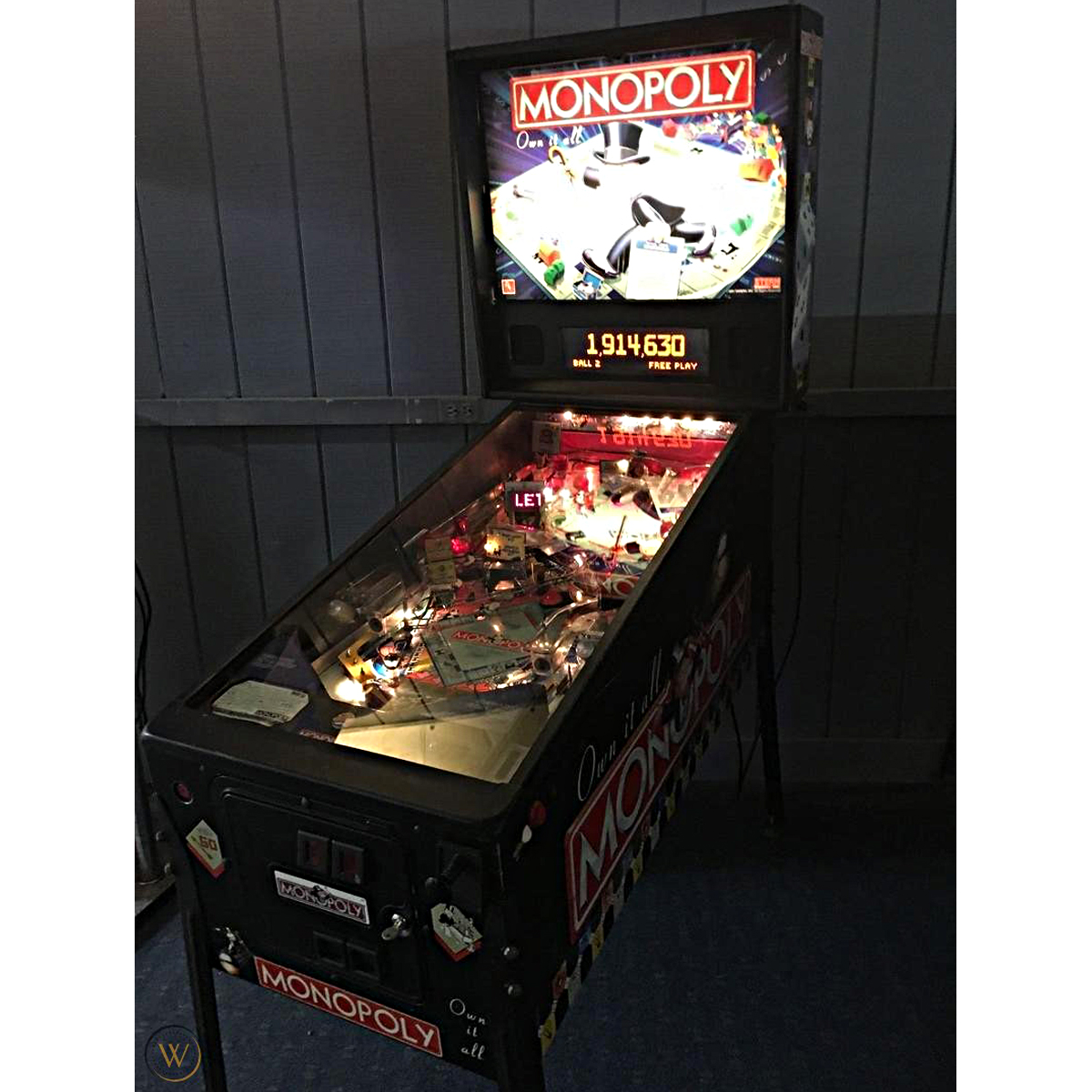 which pinball machine is better monopoly or world poker